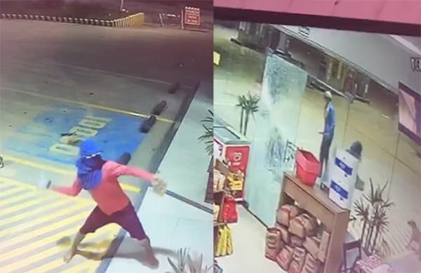VÍDEOS: Com tijolos, dupla quebra vidro e rouba cigarros e bebidas de conveniência em Manaus