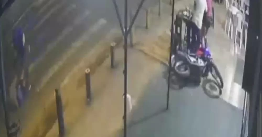 IMAGENS FORTES: Ataque em lanchonete deixa um morto e uma mulher ferida em Uberlândia